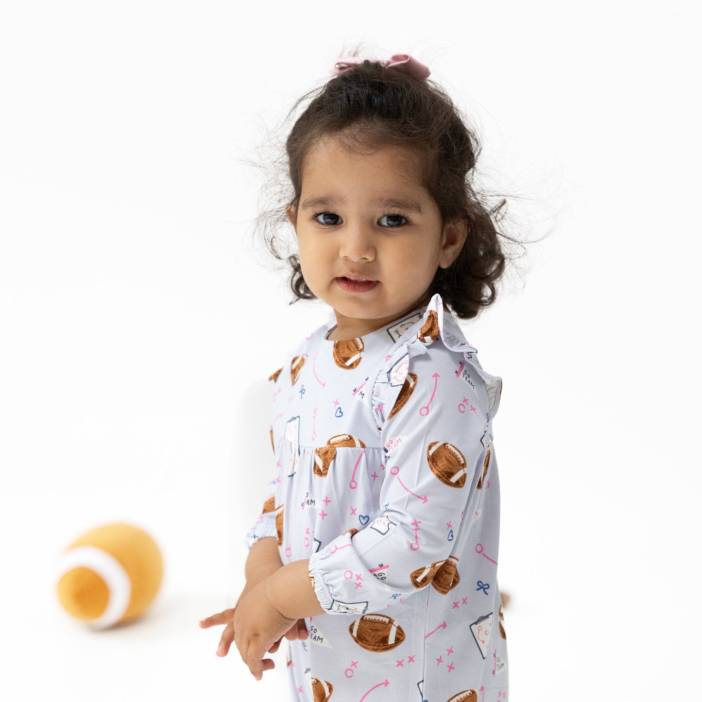 Ruffle Sleeve Romper in our  Touchdown Time - Lavender print from Angel Dear