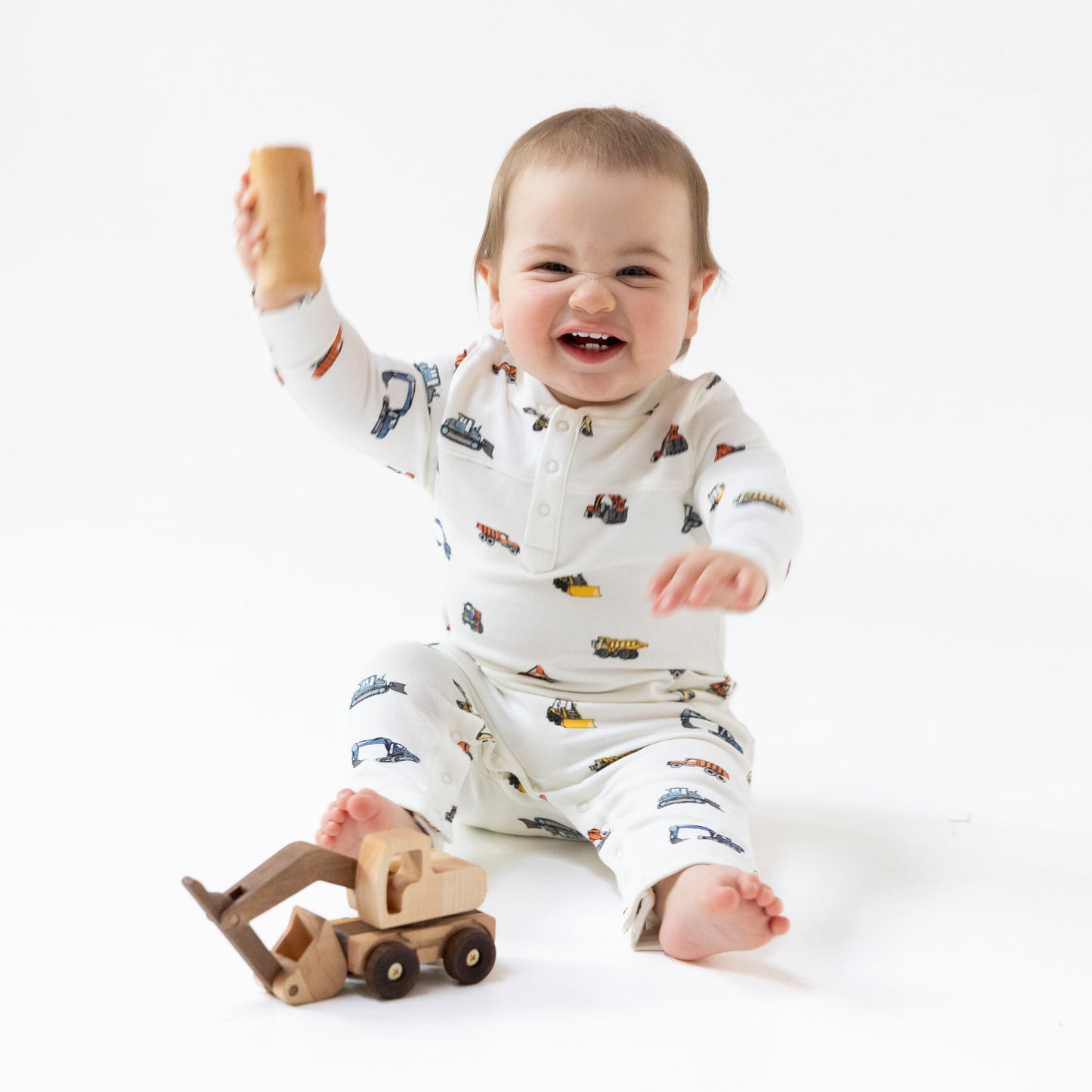 Uni Romper in our  Construction Vehicles print from Angel Dear