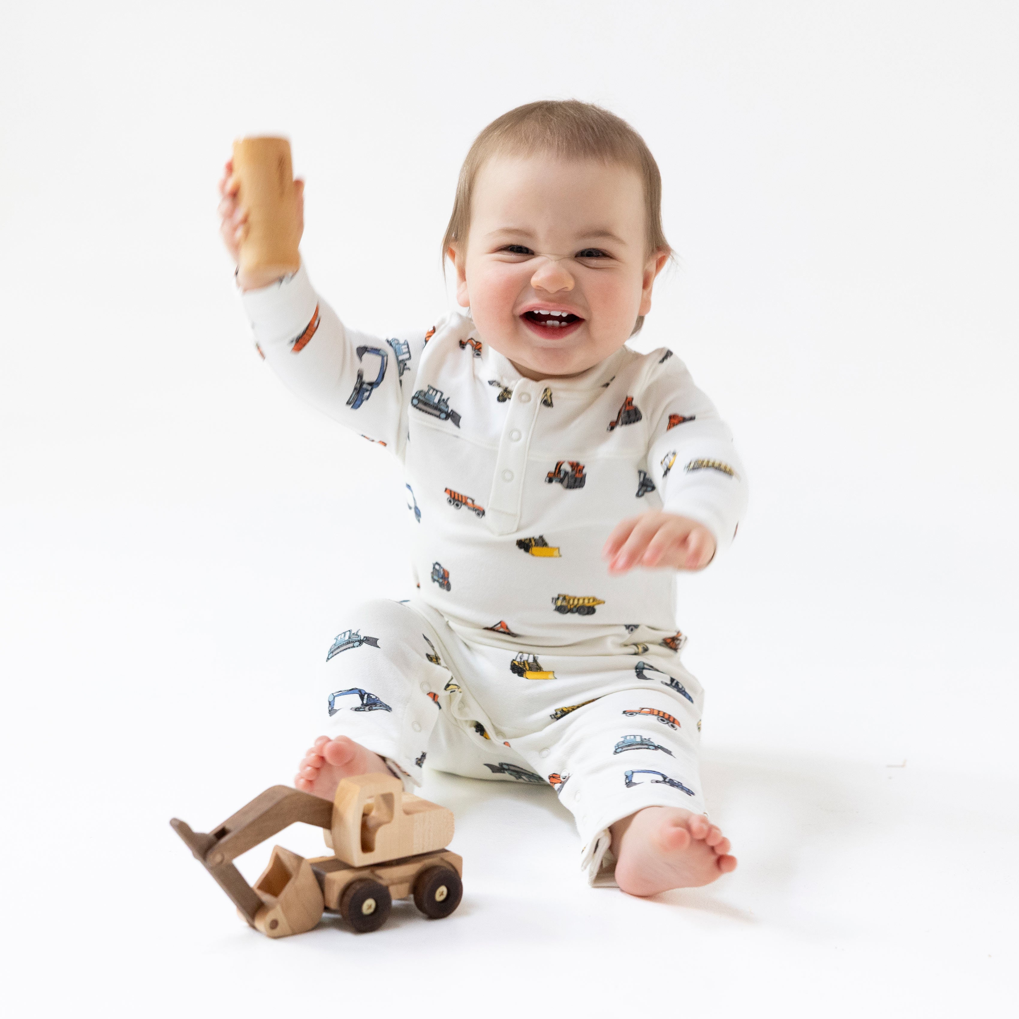 Uni Romper in our  Construction Vehicles print from Angel Dear