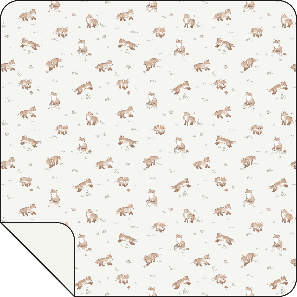Patterned blanket with small animal illustrations on a white background
