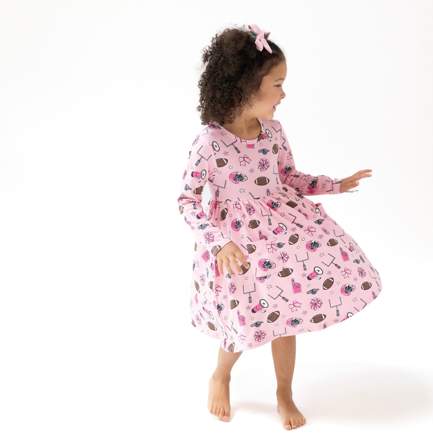 Twirly Long Sleeve Dress in our  Game Day - Pink print from Angel Dear