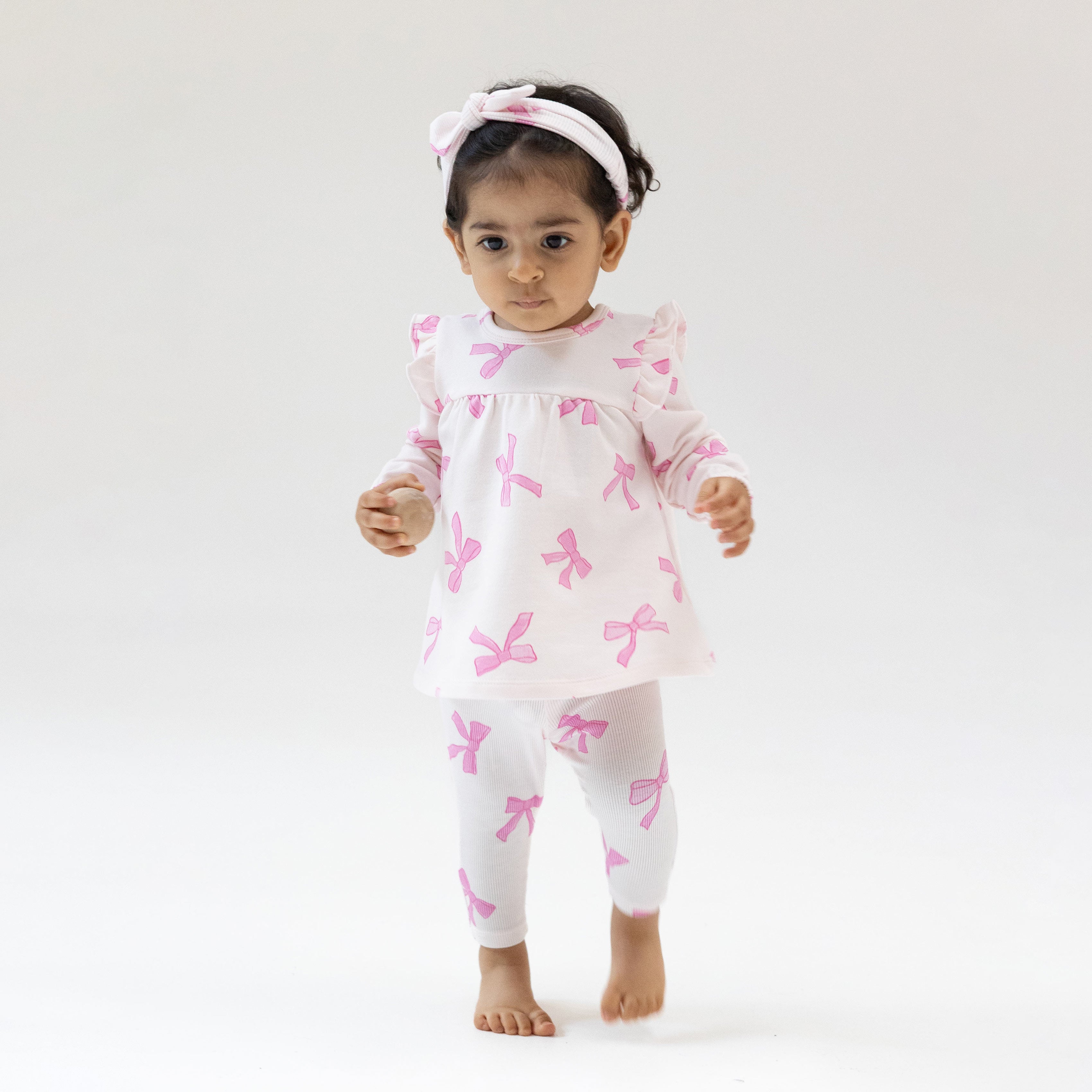 Ruffle Top and Ribbed Legging in our Pretty Bows print from Angel Dear