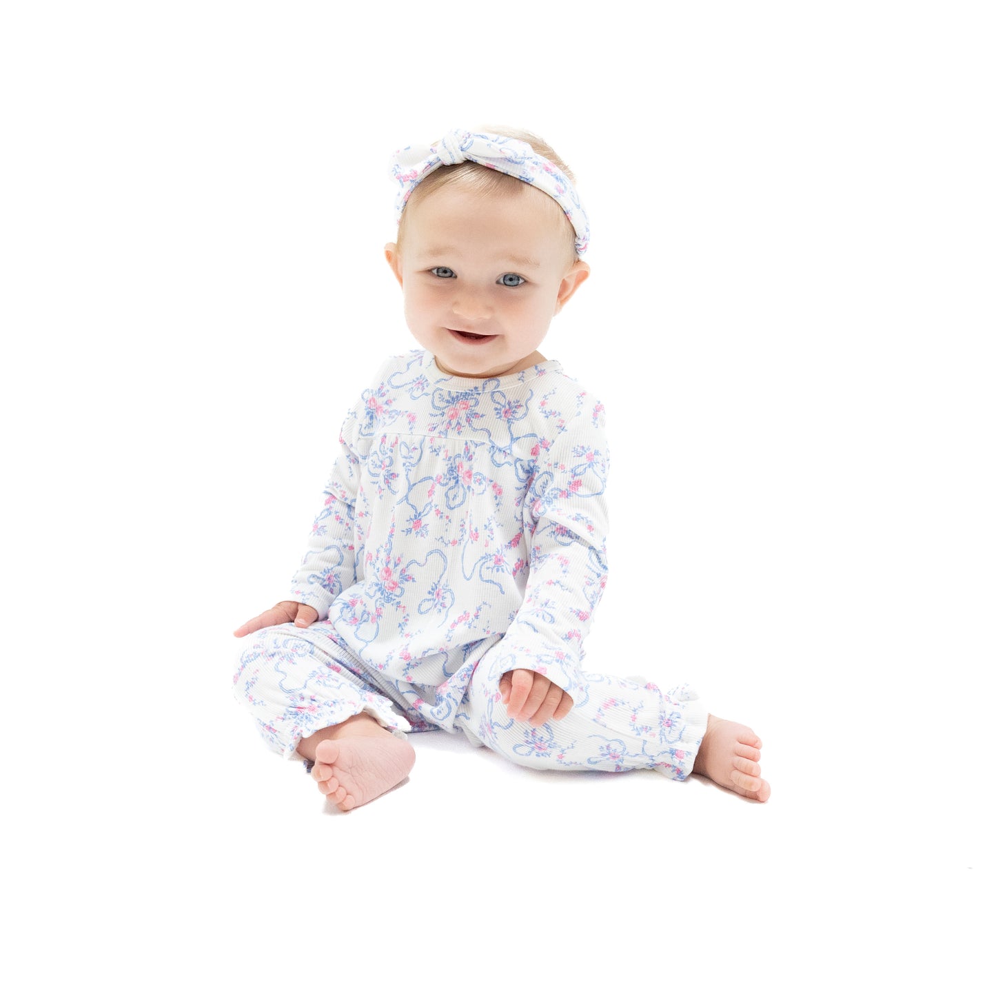 Cuffed Sleeve Romper in our  Ribbon Floral Fling print from Angel Dear