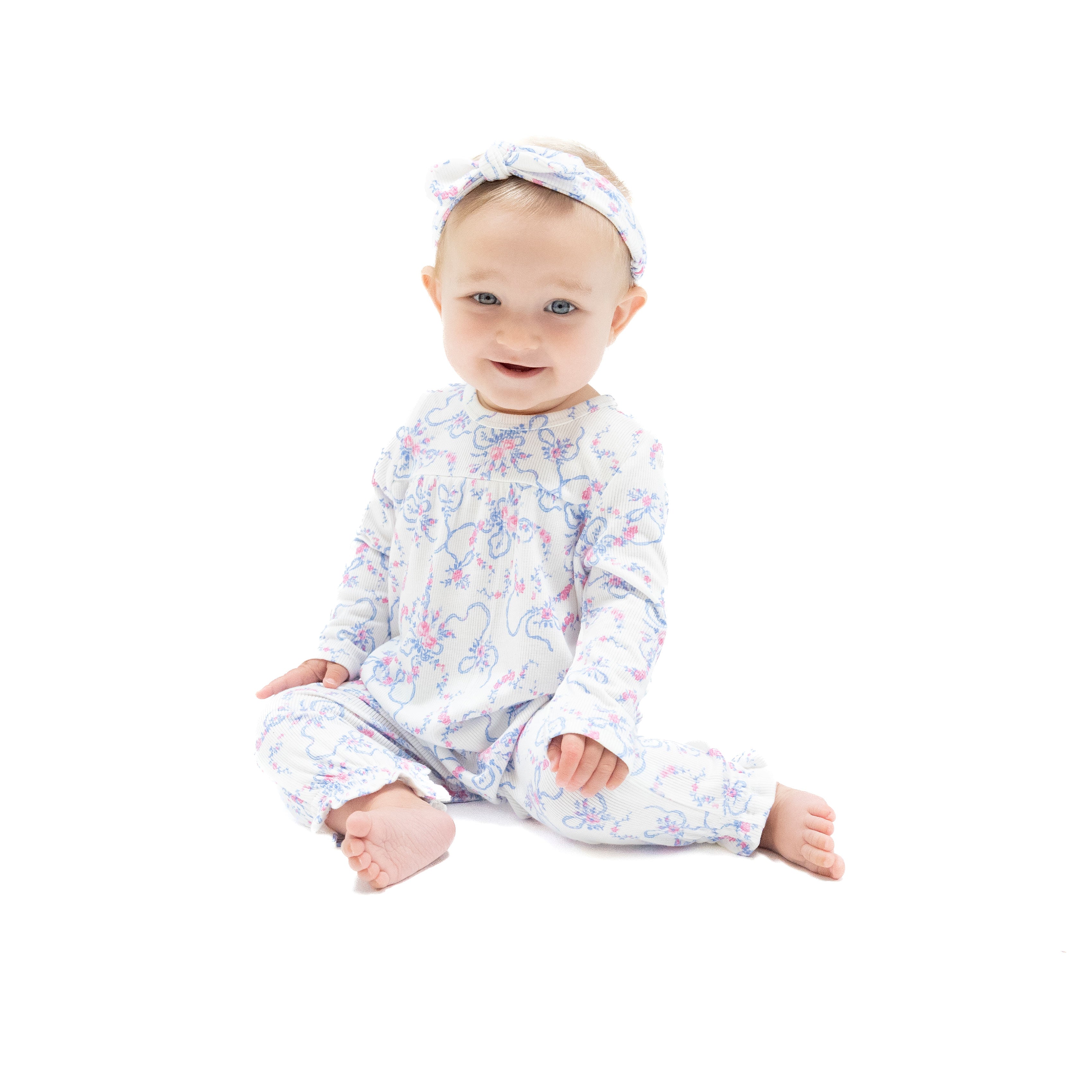 Cuffed Sleeve Romper in our  Ribbon Floral Fling print from Angel Dear