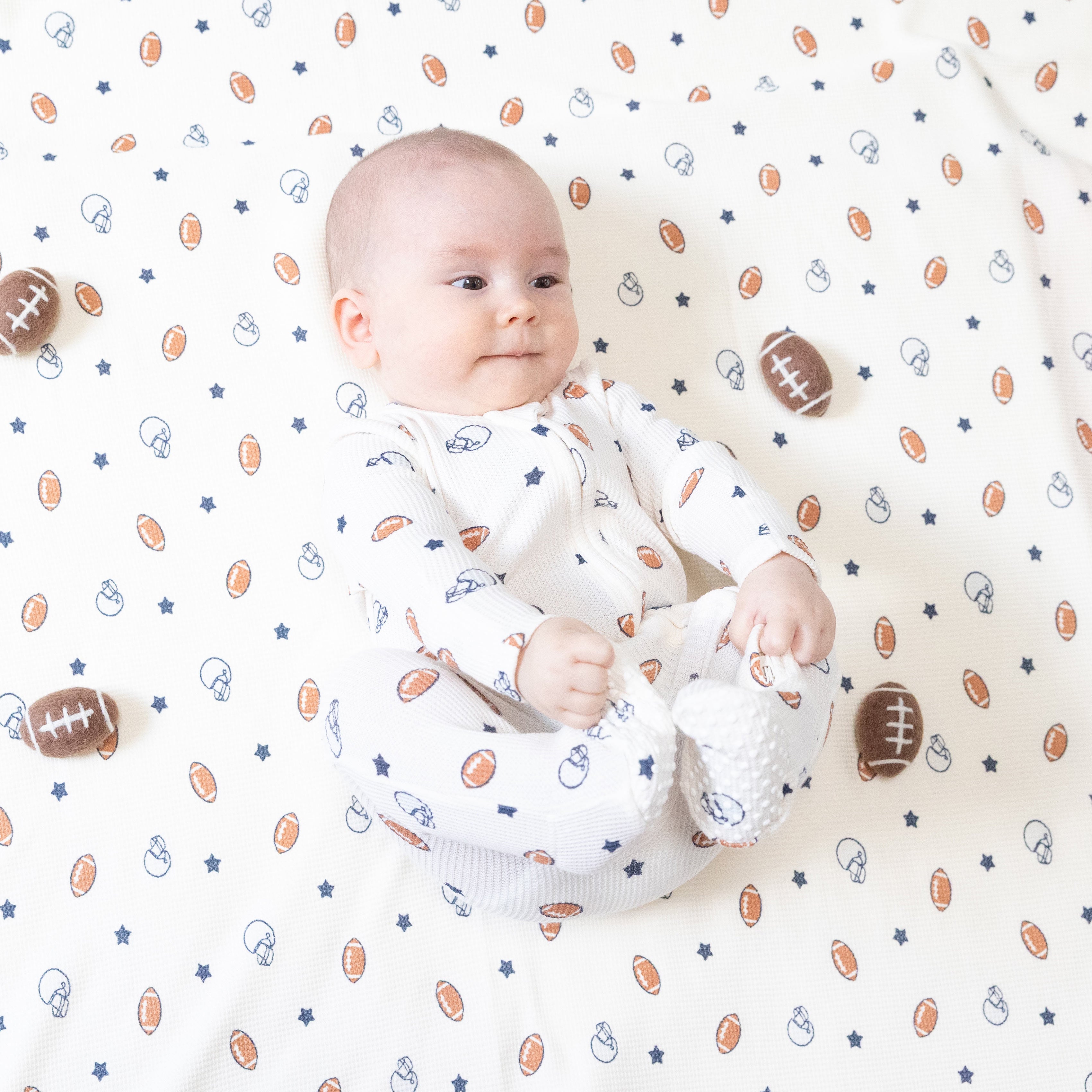 2 Way Zipper Footie in our  Footballs and Stars print from Angel Dear