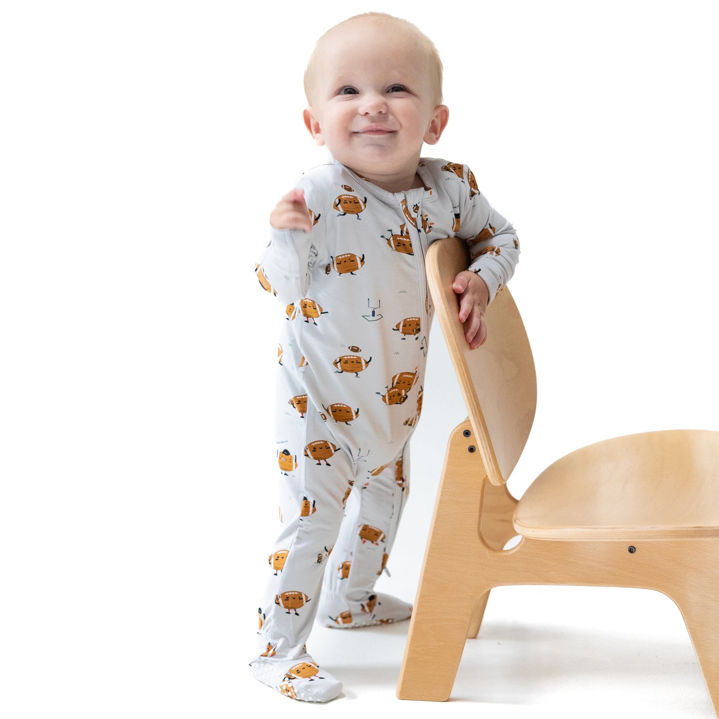 2 Way Zipper Footie in our  Footballs Playing Football print from Angel Dear