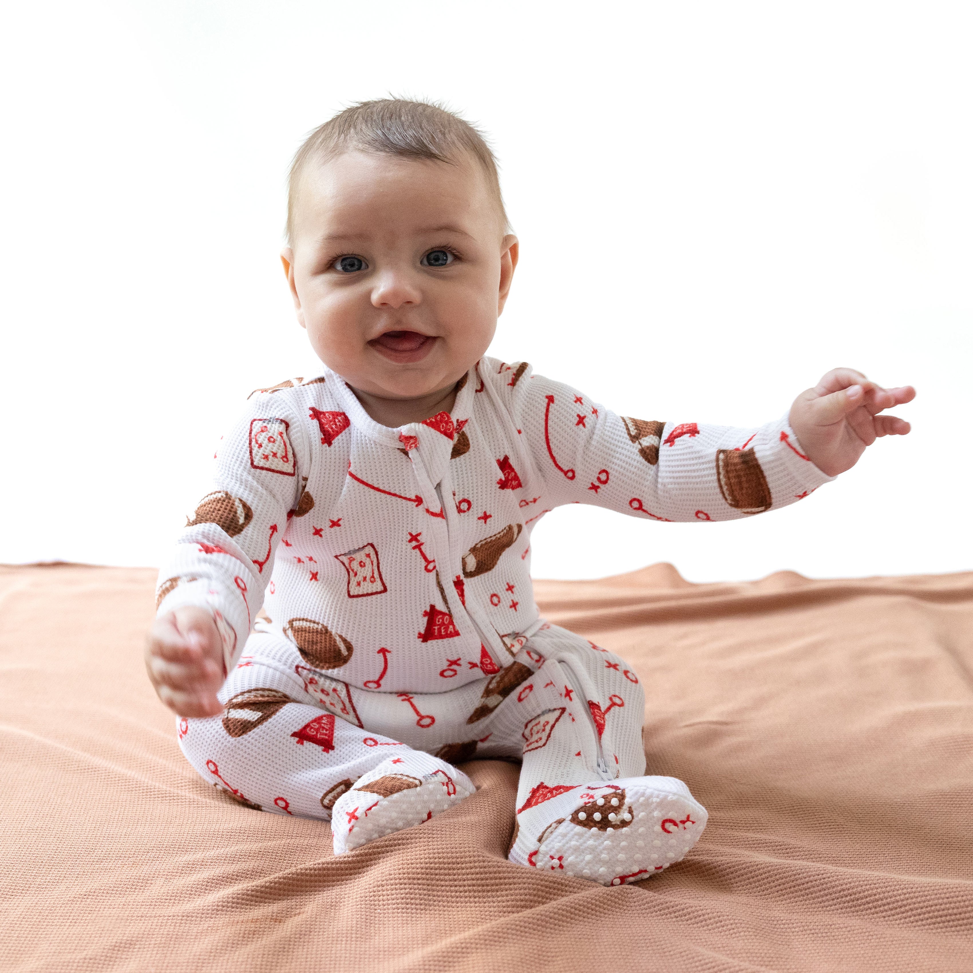 2 Way Zipper Footie in our  Touchdown Time - Red print from Angel Dear