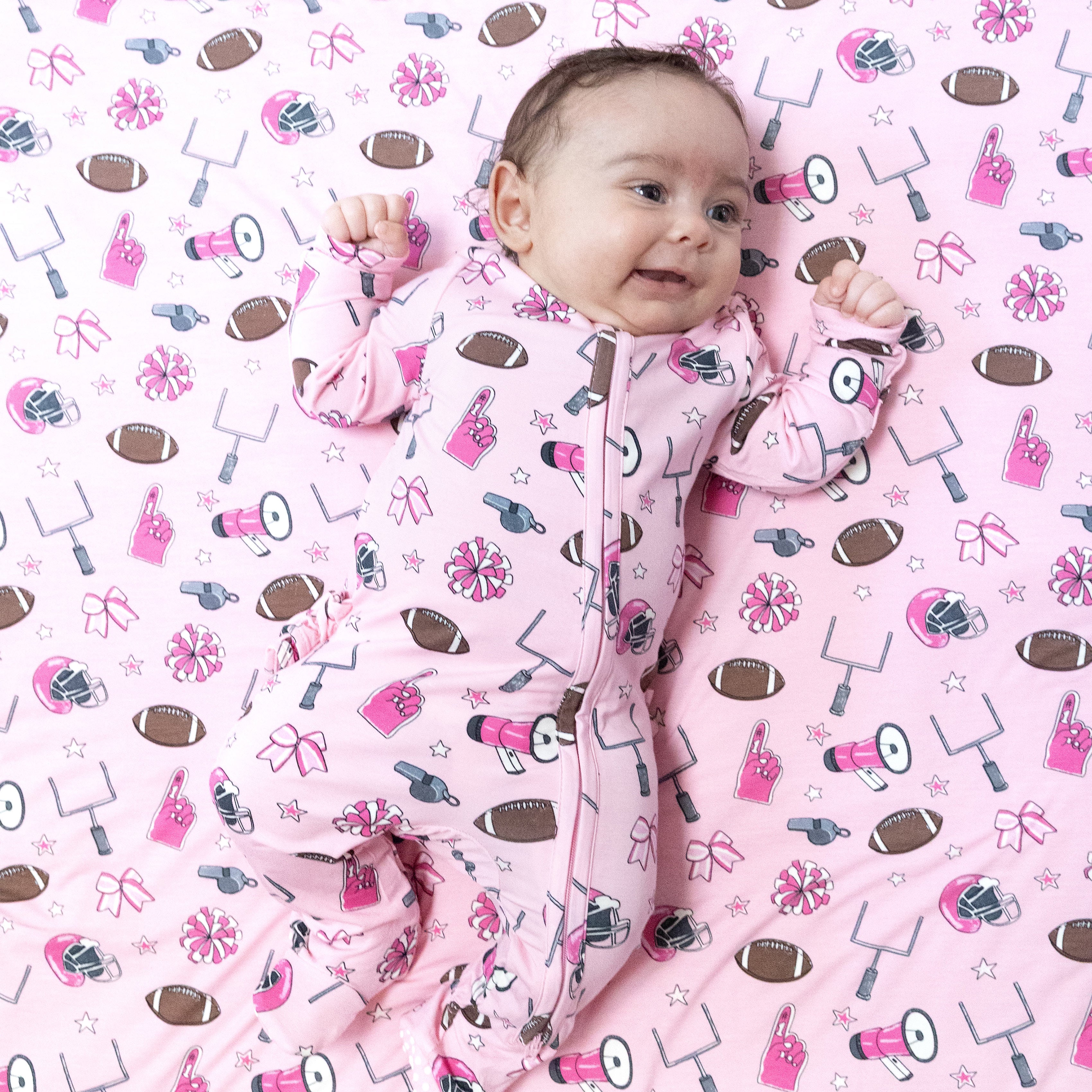 2 Way Zipper Ruffle Back Footie in our  Game day - Pink print from Angel Dear