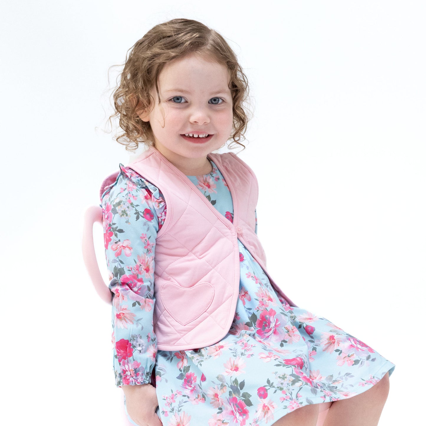 Quilted Vest with Heart Pocket in our Romance Rose print from Angel Dear