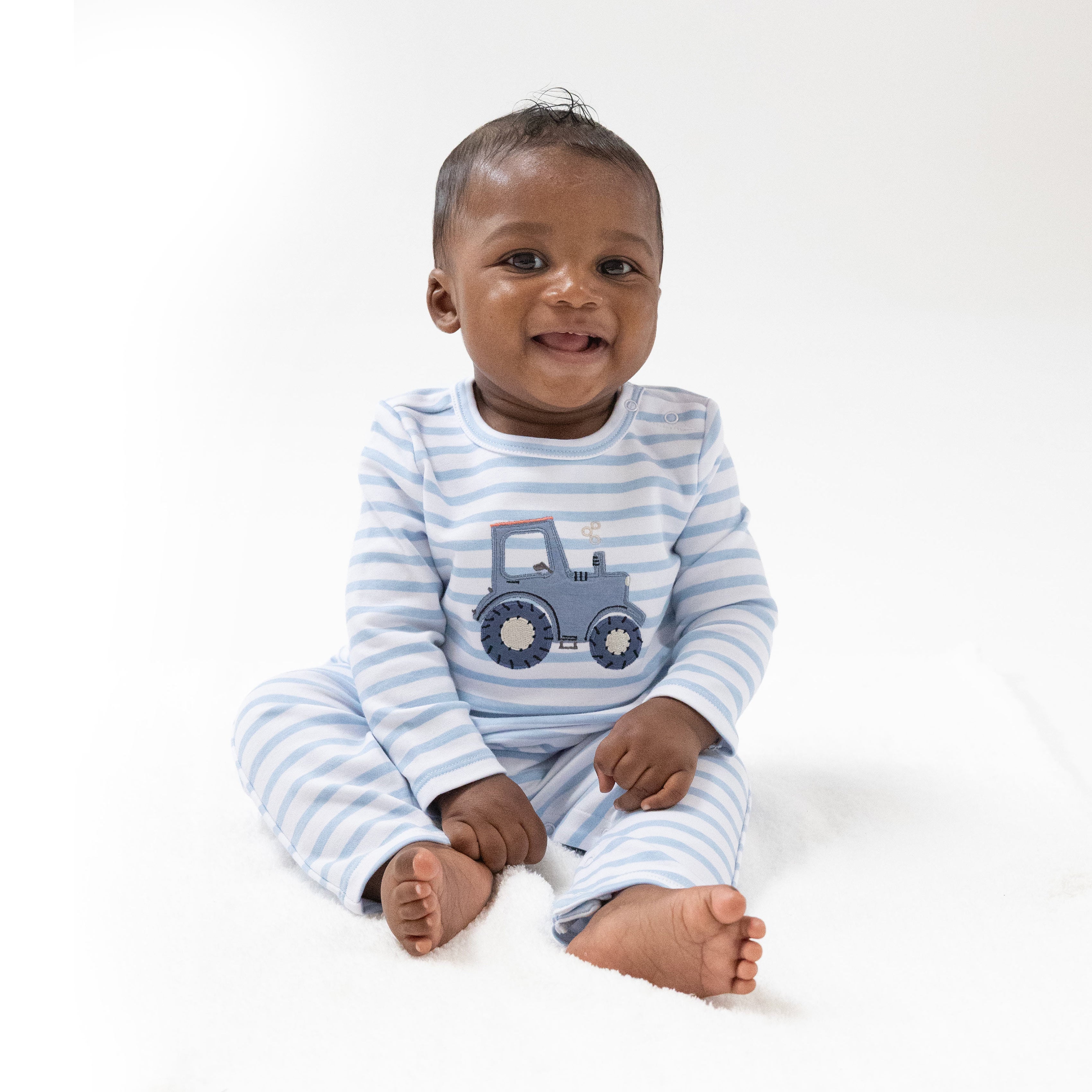 Long Sleeve Snap Shoulder Romper in our  Mini Tractors print from Angel Dear