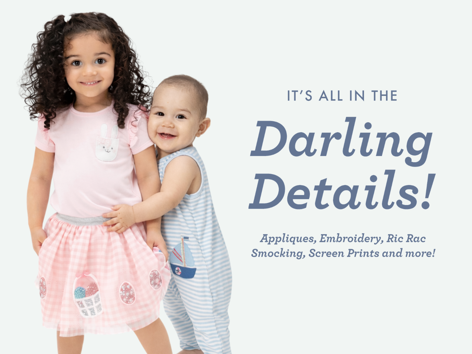 Two children hugging with text about clothing details on a light gray background